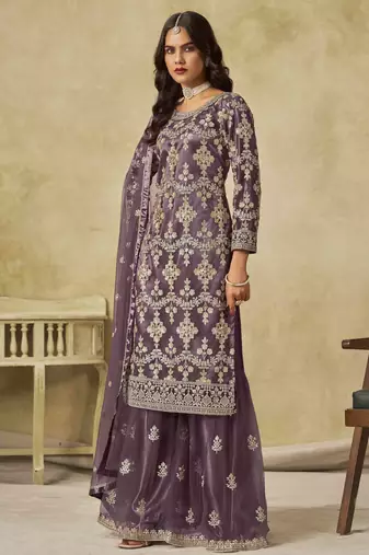 Purple net heavy thread embroidery with sequins work palazzo suit