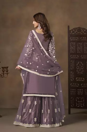 Purple net heavy thread embroidery with sequins work palazzo suit