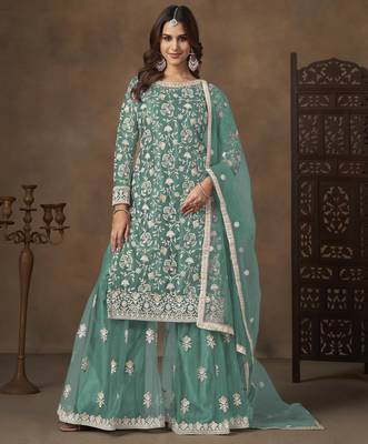Turquoise net heavy thread embroidery with sequins work palazzo suit 1