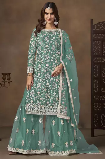 Turquoise net heavy thread embroidery with sequins work palazzo suit