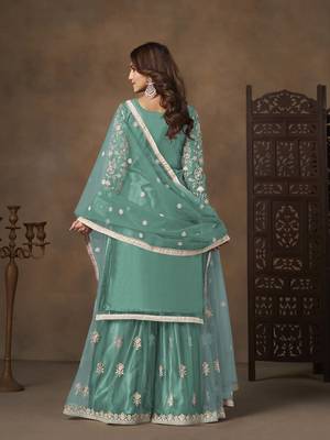 Turquoise net heavy thread embroidery with sequins work palazzo suit 4