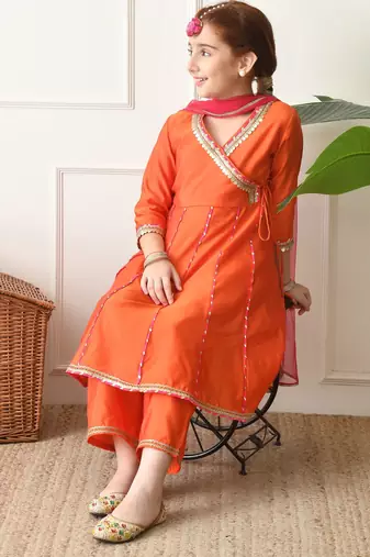 Girls orange angrakha style kurta set with pink dupatta   festive ethnic wear for girls ilksd22