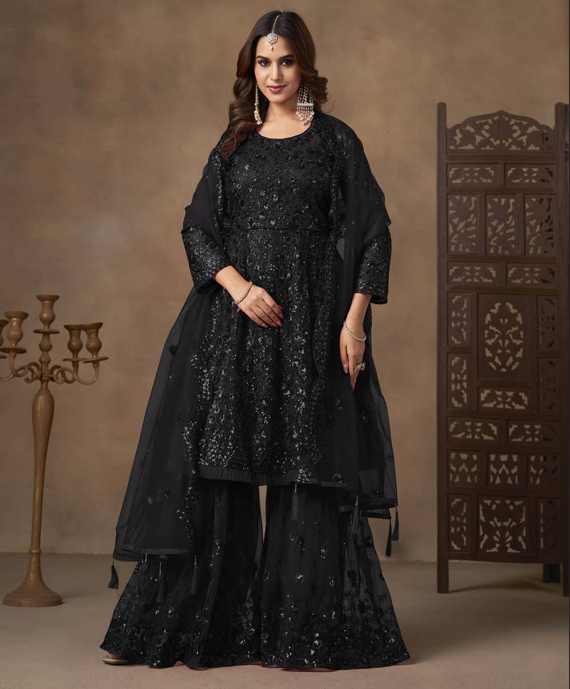 Black net heavy thread embroidery with sequins work sharara suit