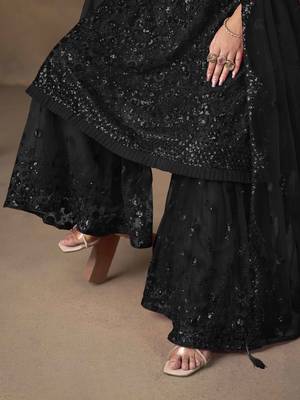 Black net heavy thread embroidery with sequins work sharara suit 5
