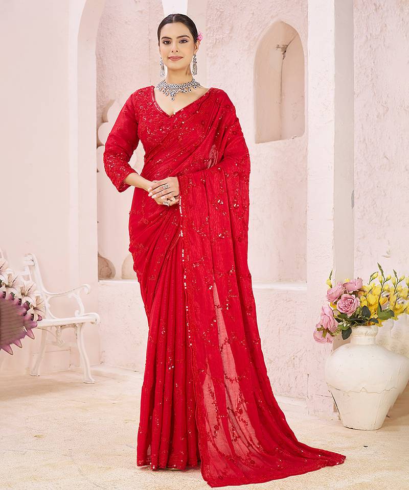 Red embroidered crepe saree