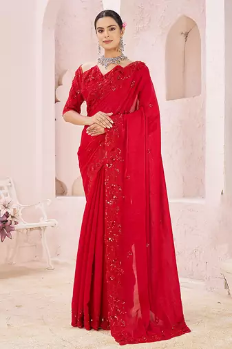 Red embroidered crepe saree