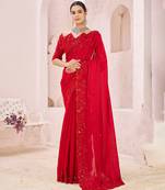Red embroidered crepe saree