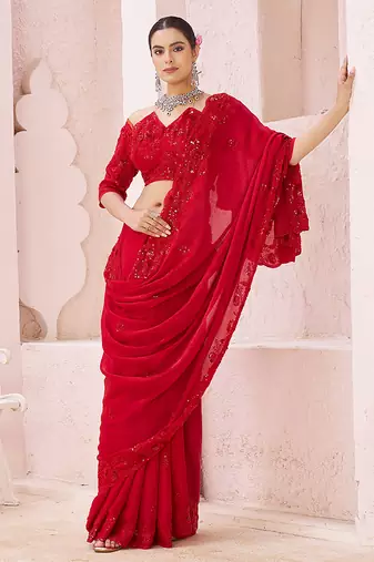 Red embroidered crepe saree
