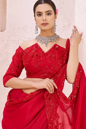 Red embroidered crepe saree