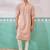peach chikankari rayon kurta with cream fine satin pyjama | distinctive festive ethnic wear