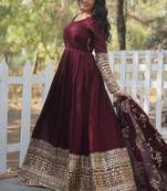 maroon faux georgette gown with full heavy embroidery  