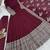 maroon faux georgette gown with full heavy embroidery  