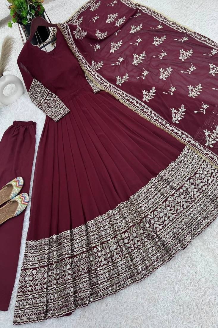 maroon faux georgette gown with full heavy embroidery  