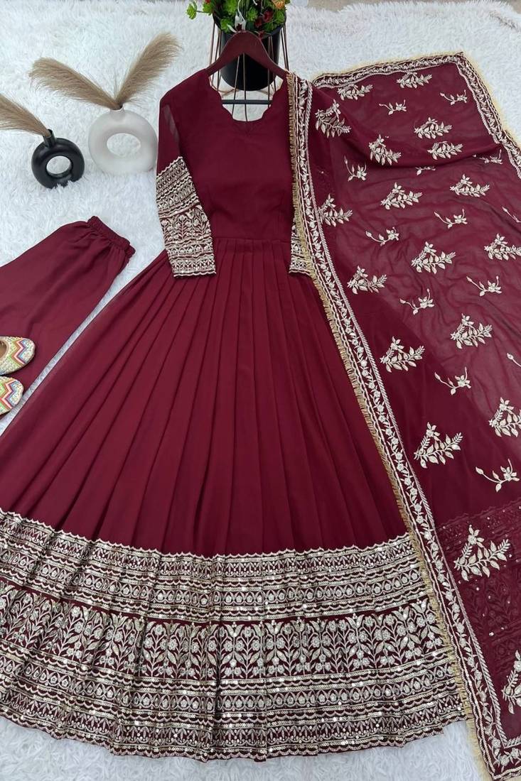 maroon faux georgette gown with full heavy embroidery  