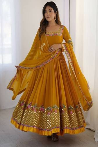 Mustard georgette gown with floral embroidery festive