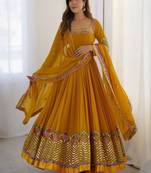 Mustard georgette gown with floral embroidery festive