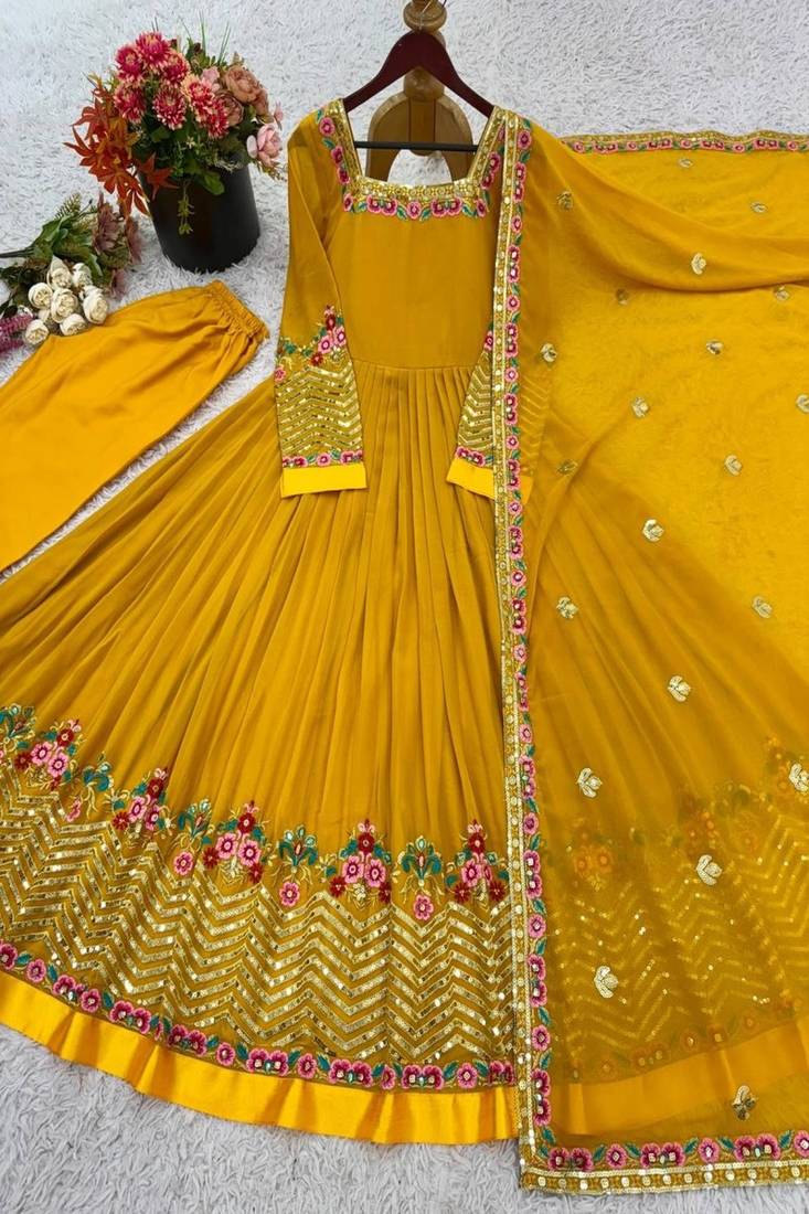 Mustard georgette gown with floral embroidery festive