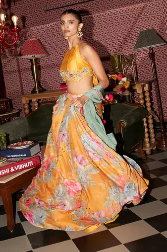 yellow floral crepe lehenga set with embroidered blouse