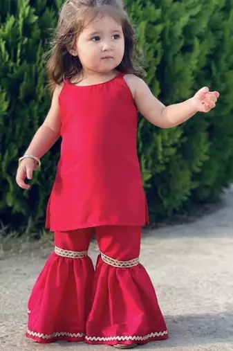 Red sleeveless top and flared pants set