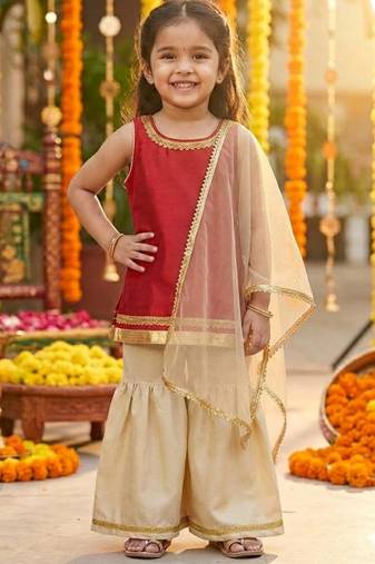 Red kurti with gold sharara and dupatta