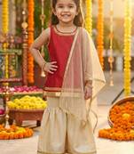 Red kurti with gold sharara and dupatta