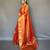 Orange tissue silk zari weaving border pallu saree with blouse