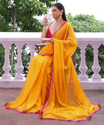 Sun yellow chiffon saree with pink accents 5