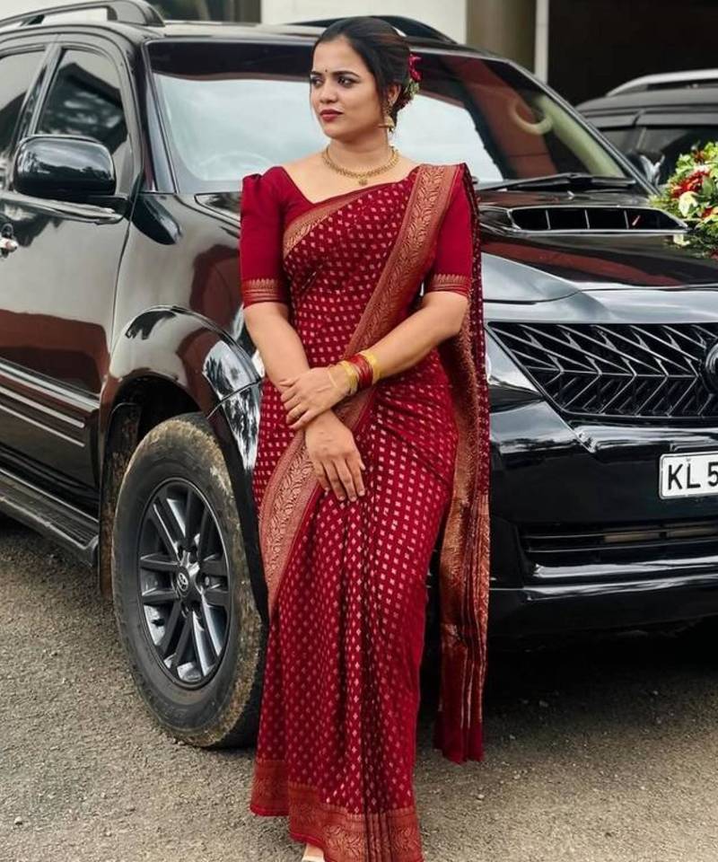 Deep maroon silk blend saree with zari butis