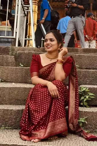 Deep maroon silk blend saree with zari butis