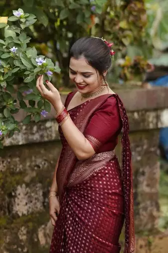Deep maroon silk blend saree with zari butis