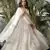 Designer ivory faux georgette party wear gown with heavy sequin work