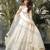 Designer ivory faux georgette party wear gown with heavy sequin work
