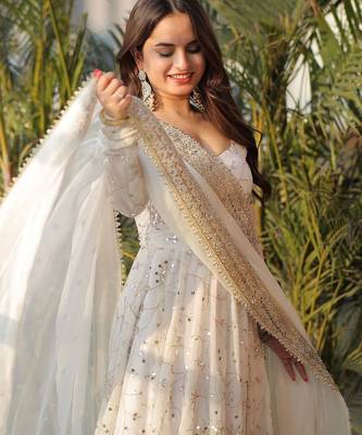 Designer ivory faux georgette party wear gown with heavy sequin work 4