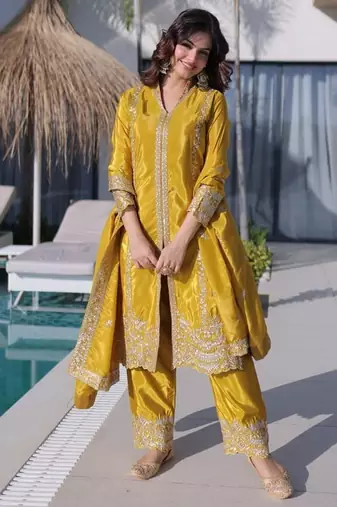 Elegant mustard traditional suit with sequins & zari embellishment