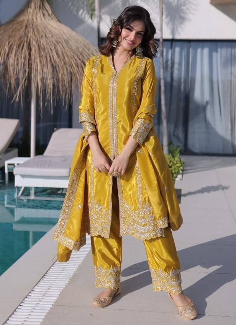 Elegant mustard traditional suit with sequins & zari embellishment
