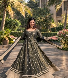 Green chinon silk anarkali gown with heavy cording embroidery & sequins work