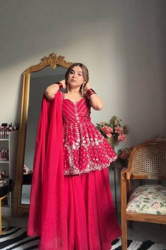Pink faux blooming peplum sharara set with heavy sequins & multi zari thread embroidery