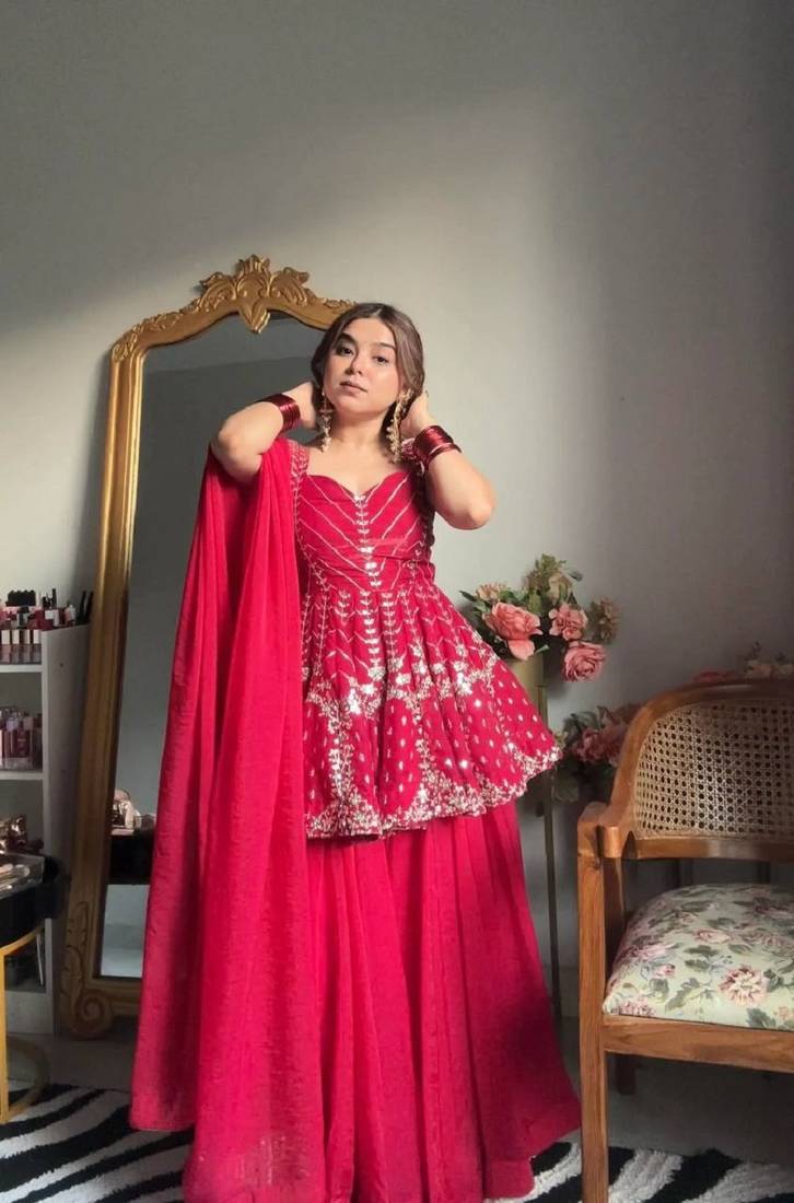 Pink faux blooming peplum sharara set with heavy sequins & multi zari thread embroidery