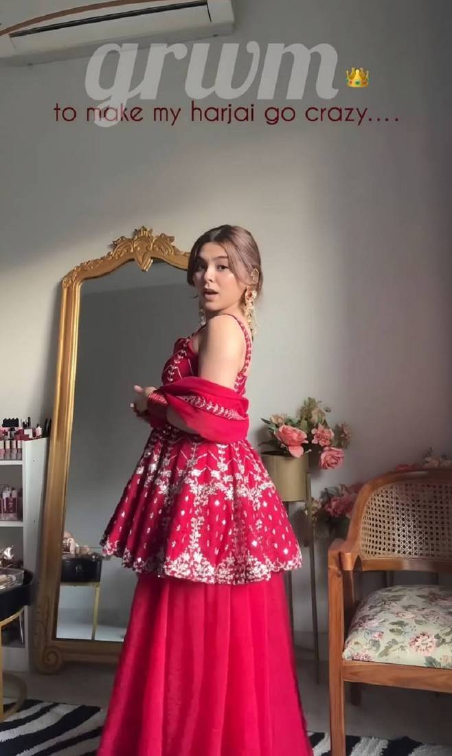 Pink faux blooming peplum sharara set with heavy sequins & multi zari thread embroidery