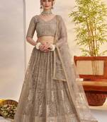 Gleaming Gray Sequins Net Bridesmaid Lehenga Choli With Dupatta