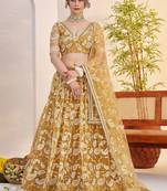 Superior Yellow Thread Embroidered Net Lehenga Choli With Dupatta