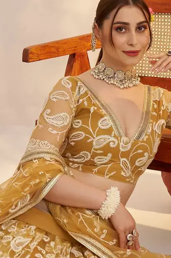 designer yellow thread embroidered work net lehenga choli set