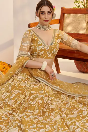 designer yellow thread embroidered work net lehenga choli set