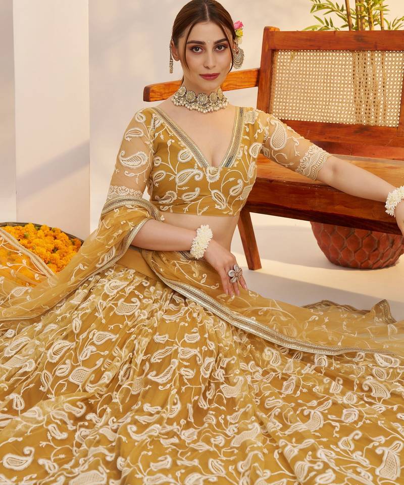 Superior Yellow Thread Embroidered Net Lehenga Choli With Dupatta