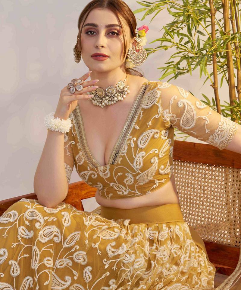 Superior Yellow Thread Embroidered Net Lehenga Choli With Dupatta