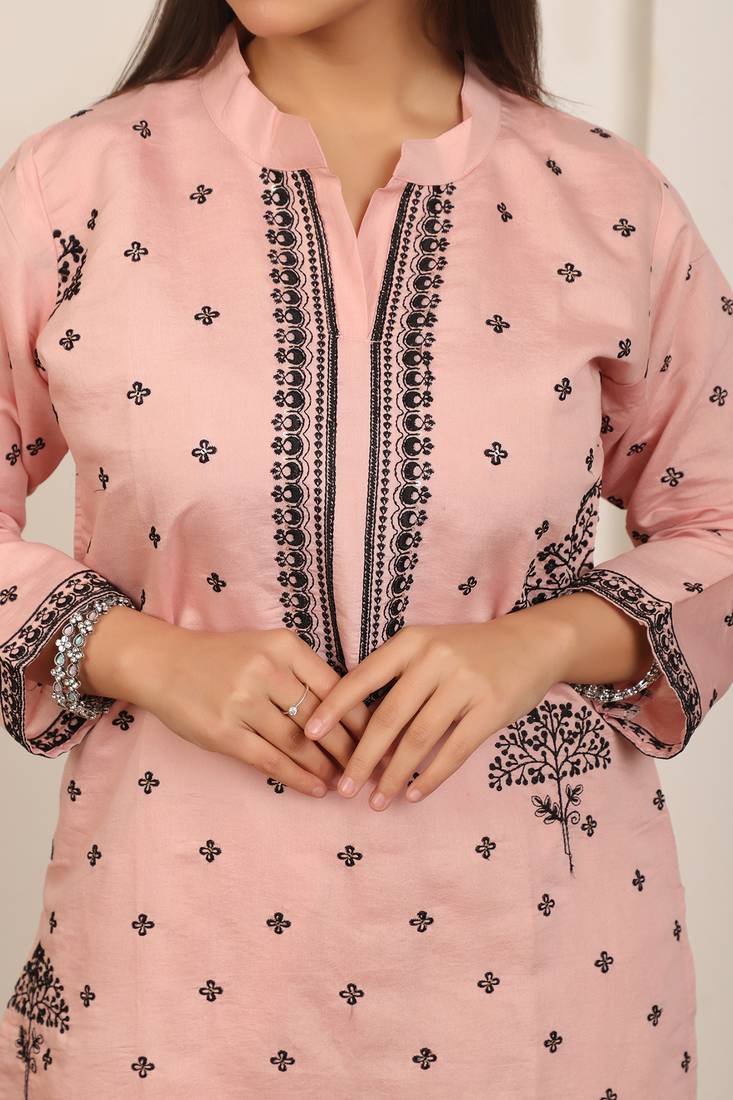 Peach embroidery work cotton blend kurta trousers with dupatta.