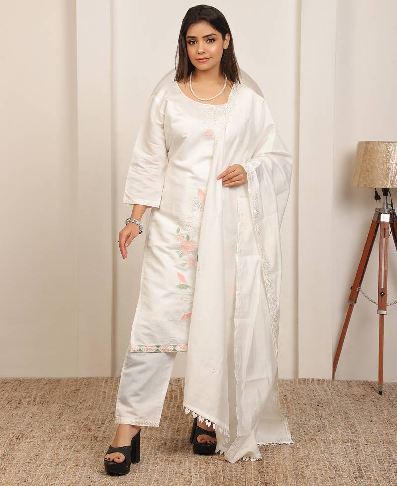 White embroidery work cotton blend kurta trousers with dupatta.
