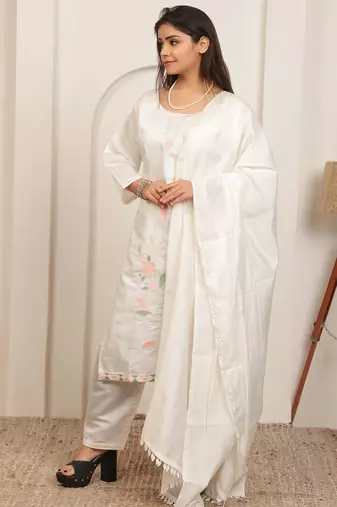 White embroidery work cotton blend kurta trousers with dupatta.