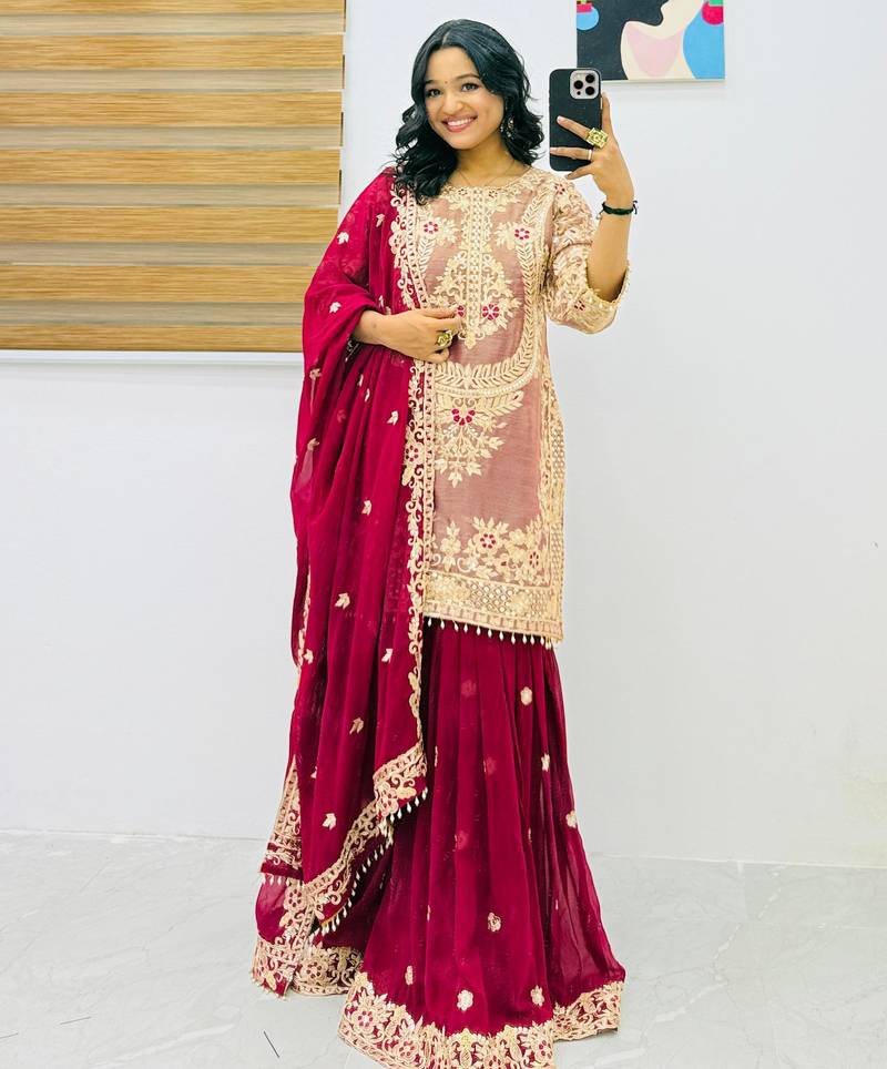 Dark pink intricate zari work sharara suit