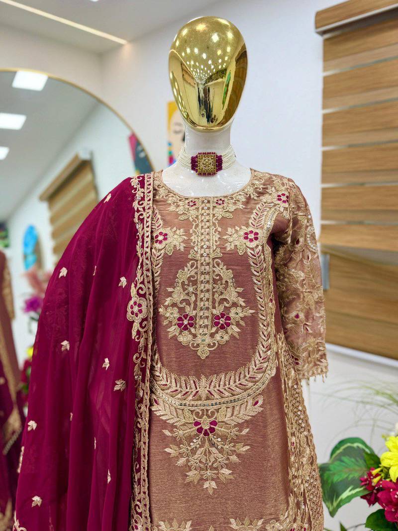 Dark pink intricate zari work sharara suit